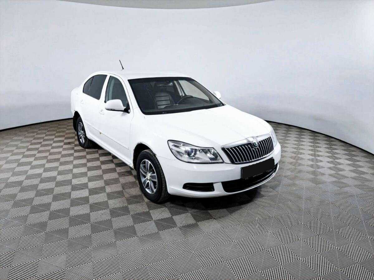 Skoda Octavia б/у, 2012, Механическая. Фото: #2